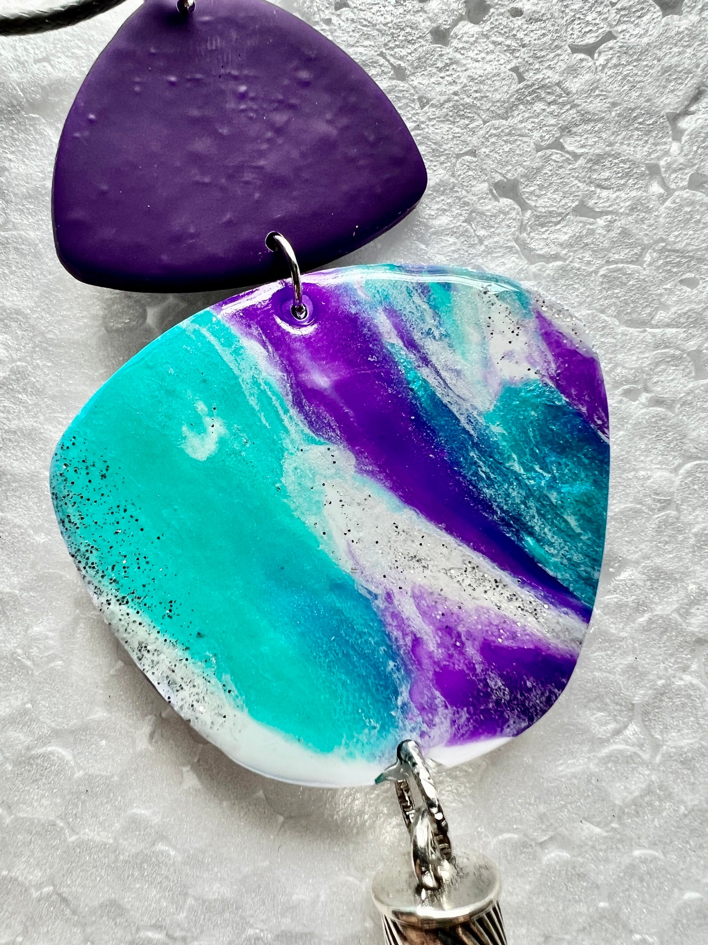 Purple aqua and silver shimmer with a violet tassel