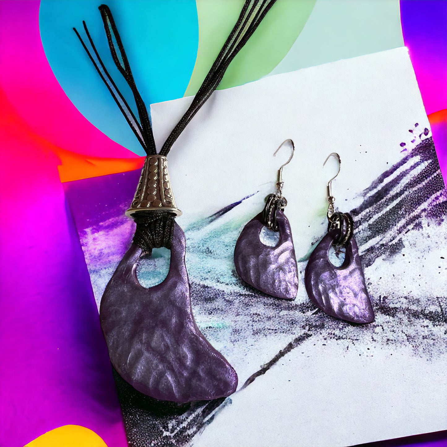 Purple pendant with earrings