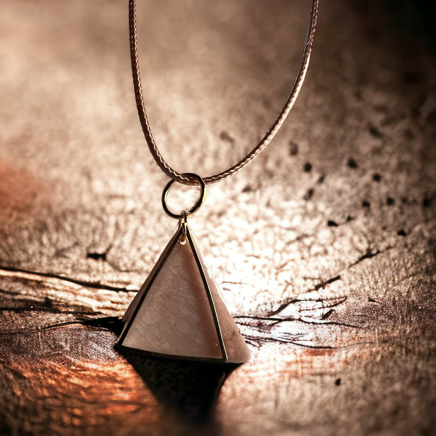Creamy peach tone triangle with gold accent
