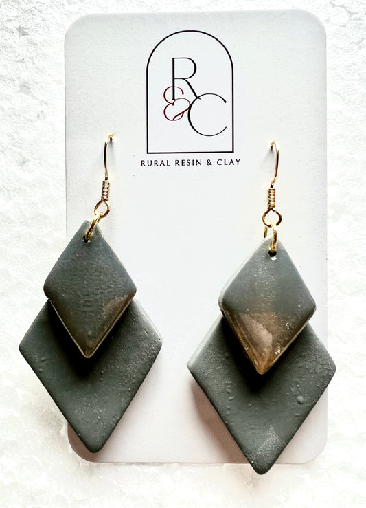 Grey diamond with a gold shimmer diamond