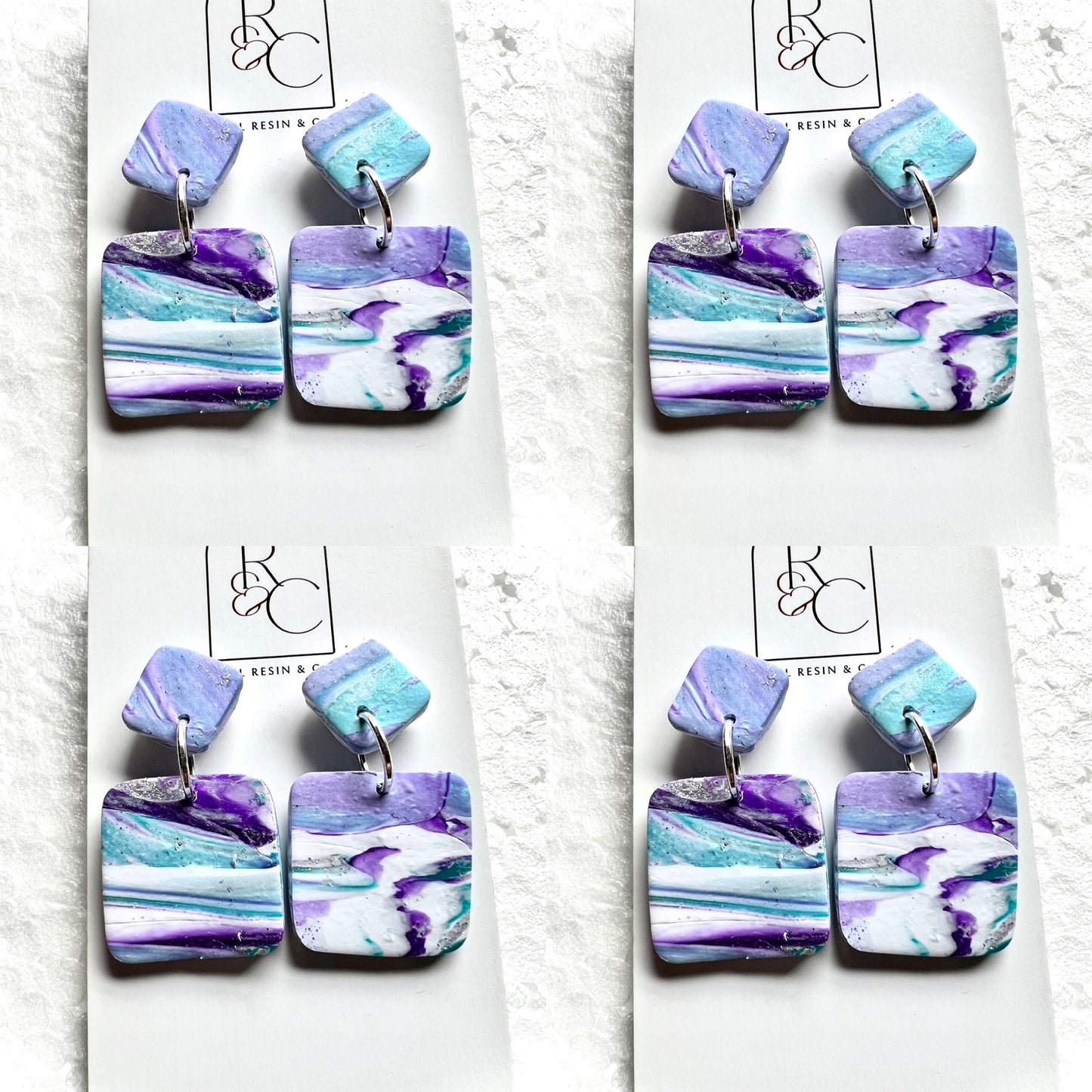 Ripples of purples, aquas with white