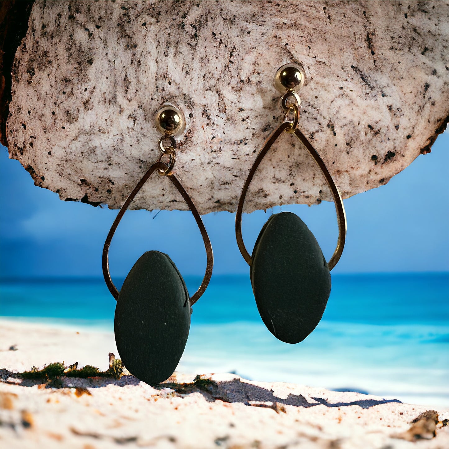 The Jillian is a simple tear drop with clay gem.