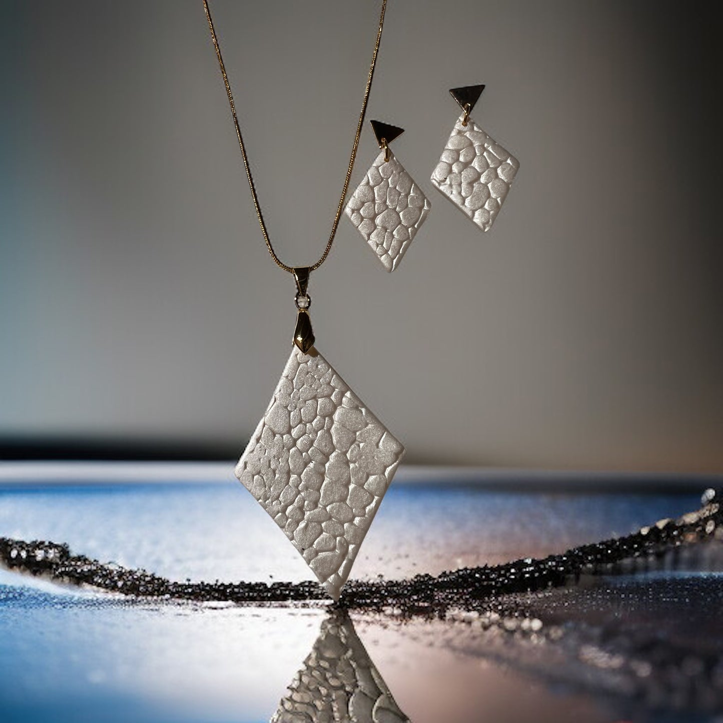 Pebbled pearl diamond shaped pendant & earrings